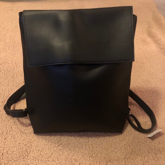 Solstice Handbags - NWT Black leather back pack/purse